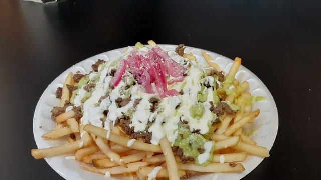 Taquiza Fries.
